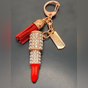 Red rose gold livestock crystal keychain with a tag the says forever